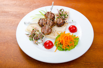 Meat cuisine - kebab served in plate