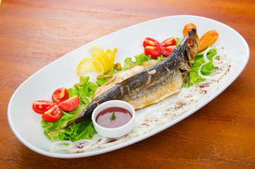 Fried fish in the plate