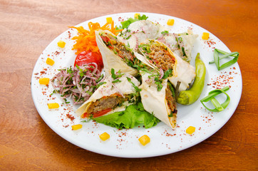 Kebab served in the plate
