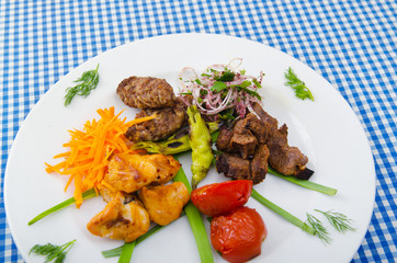 Plate with tasty lamp kebabs