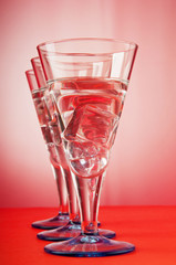 Water in the glass against gradient background