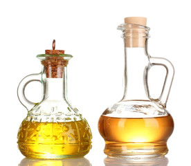 two jars with the oil isolated on white