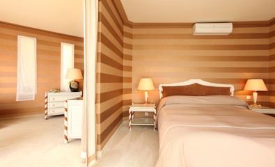 Fototapeta na wymiar interior luxury apartment, comfortable bedroom
