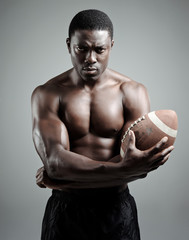Muscular american football player