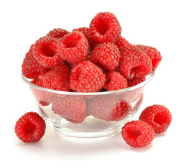 A dish with fresh raspberries isolated on white