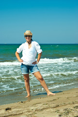 Cheerful woman on the beach