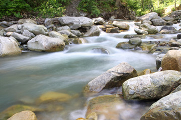 Fototapeta na wymiar Beautiful cascade in Carpathian forest, Ukraine. Long exposure