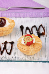 Fruit tarts with whipped cream