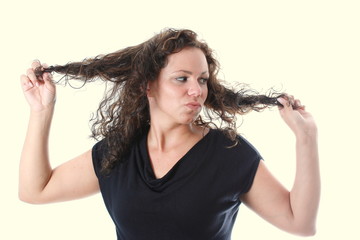young woman is furious about her hair