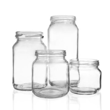 Four empty glass jars
