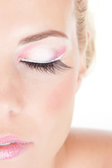 Portrait of beautiful girl with pink glamour make-up