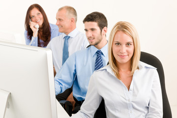 Fototapeta premium Business team happy sit in line behind table