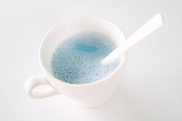 Blue water in the cup