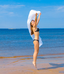 Fototapeta na wymiar Woman Posing Beach