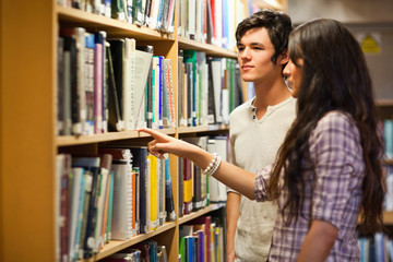 Students choosing a book