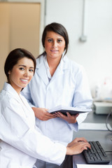 Fototapeta premium Portrait of scientists with a report