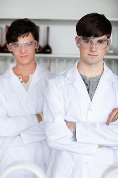 Portrait of serious male scientists posing