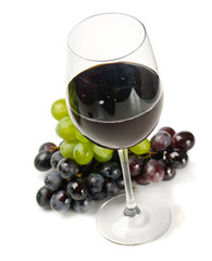 Red wine and grapes isolated on white background