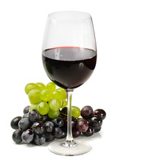 Red wine and grapes isolated on white background