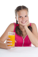 Young girl with a juice glass
