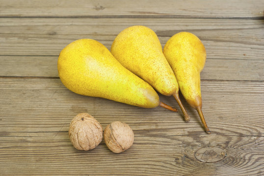 pears on old wooden table