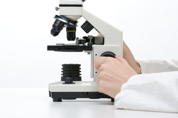 Scientist with microscope