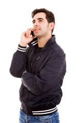 Fototapeta premium Young casual man on the phone, isolated on white