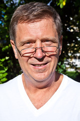 happy attractive man in the garden