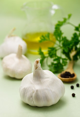 Garlic with peppercorn, parsley and olive oil