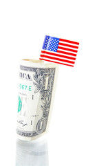 US flag and a dollar bill on white