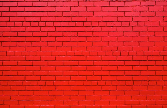 Fototapeta Red brick wall further back
