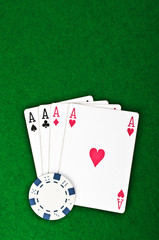 four aces and poker chips