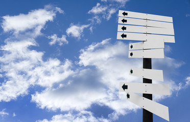 blank direction sign on sky background