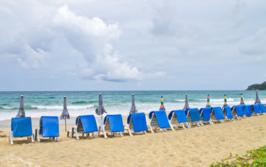 beach chairs and  umbrella