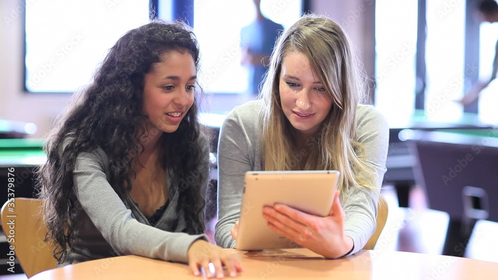 Poster Fellow students using a tablet computer