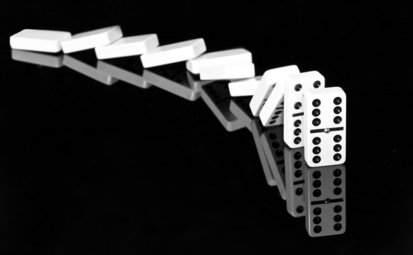 Falling Dominos In Black And White