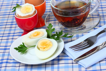 delicious breakfast of boiled eggs and tea