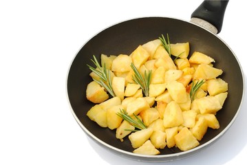 roasted potatoes with rosemary in frying pan