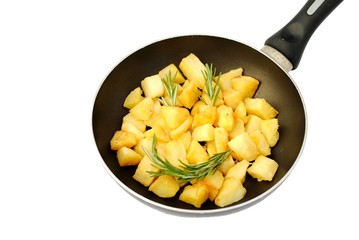 roasted potatoes with rosemary in frying pan