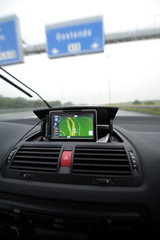 Satellite navigation screen on car dashboard