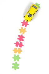 Puzzle and toy car