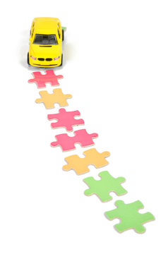 Puzzle and toy car
