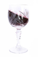 Glass of red wine isolated in white
