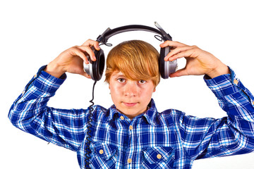 boy with headphones listens to music