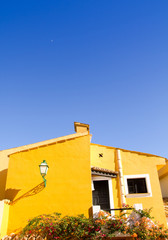 Mediterranean yellow houses in Cala Fornells Mallorca