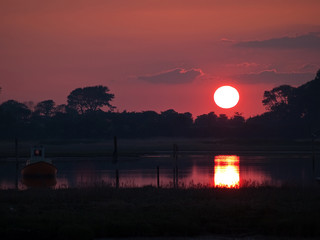 Obraz premium Boat in sunset