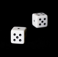 Die in black background.