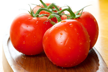 Fresh juicy tomatoes close up