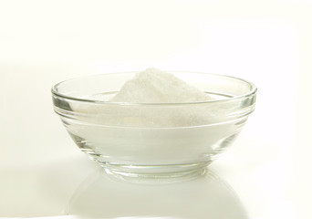 Fototapeta na wymiar Zucker in Glasschale / Sugar in glass bowl