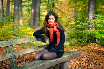 Young woman in autumn park